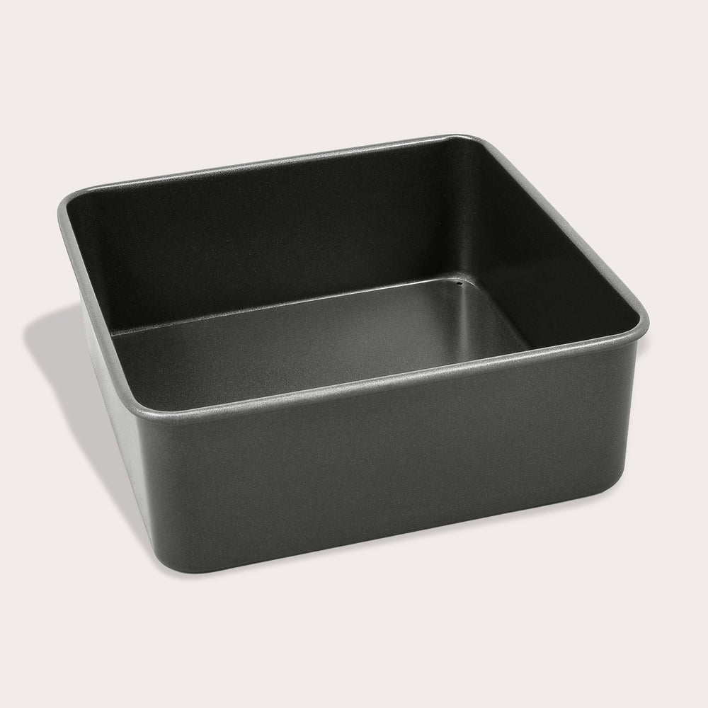 The Zyliss Non-Stick Base Square Pan 20cm/8" in black carbon steel with high sides is shown on a light background.