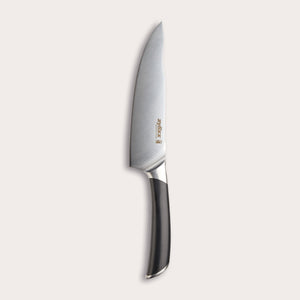The Zyliss Comfort Pro Chefs Knife 20cm/8, with a German stainless steel blade and a black and silver ergonomic handle, is shown standing vertically on a light, plain background. 