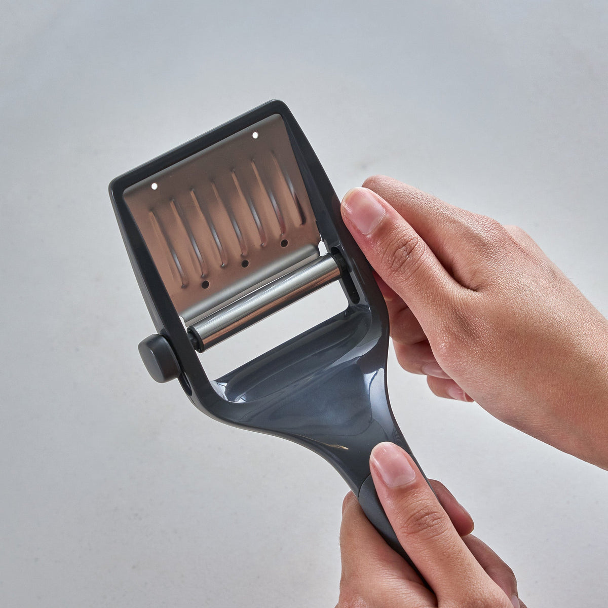 Zyliss Utility Cheese Plane in use