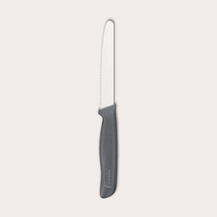 The Zyliss Tomato Knife Serrated 11cm / 4½ features a silver serrated blade and an eco-friendly handle, shown against a plain white background. 