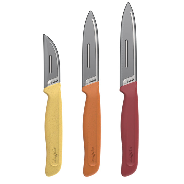 Three knives with yellow, orange, and red handles arranged side by side; each knife in the Zyliss Classic 3 Piece Peeling & Paring Knife Set has a stainless steel blade showing the Zyliss name.
