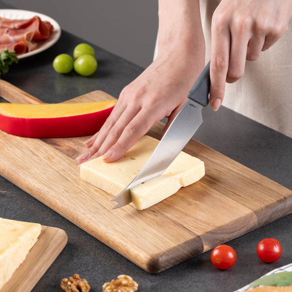 Zyliss Utility Universal Cheese Knife — in use