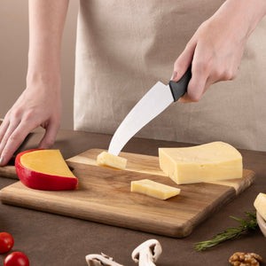 Zyliss Utility Universal Cheese Knife — in use