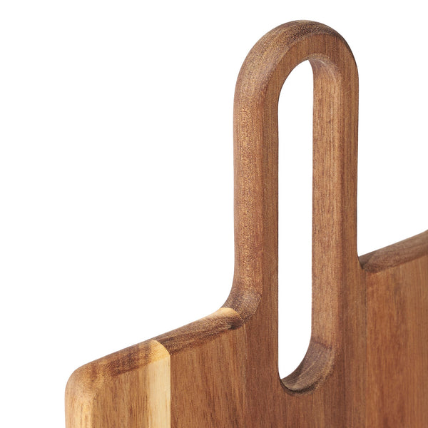Close-up of the acacia serving board from the Zyliss Signature 3 Piece Cheese Knife & Acacia Serving Board Set, highlighting the smooth grain, rounded rectangular handle hole, and edges.