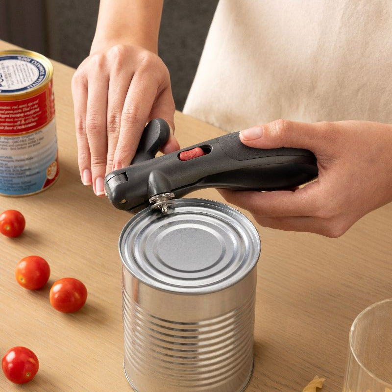 A dark gray ergonomic can opener